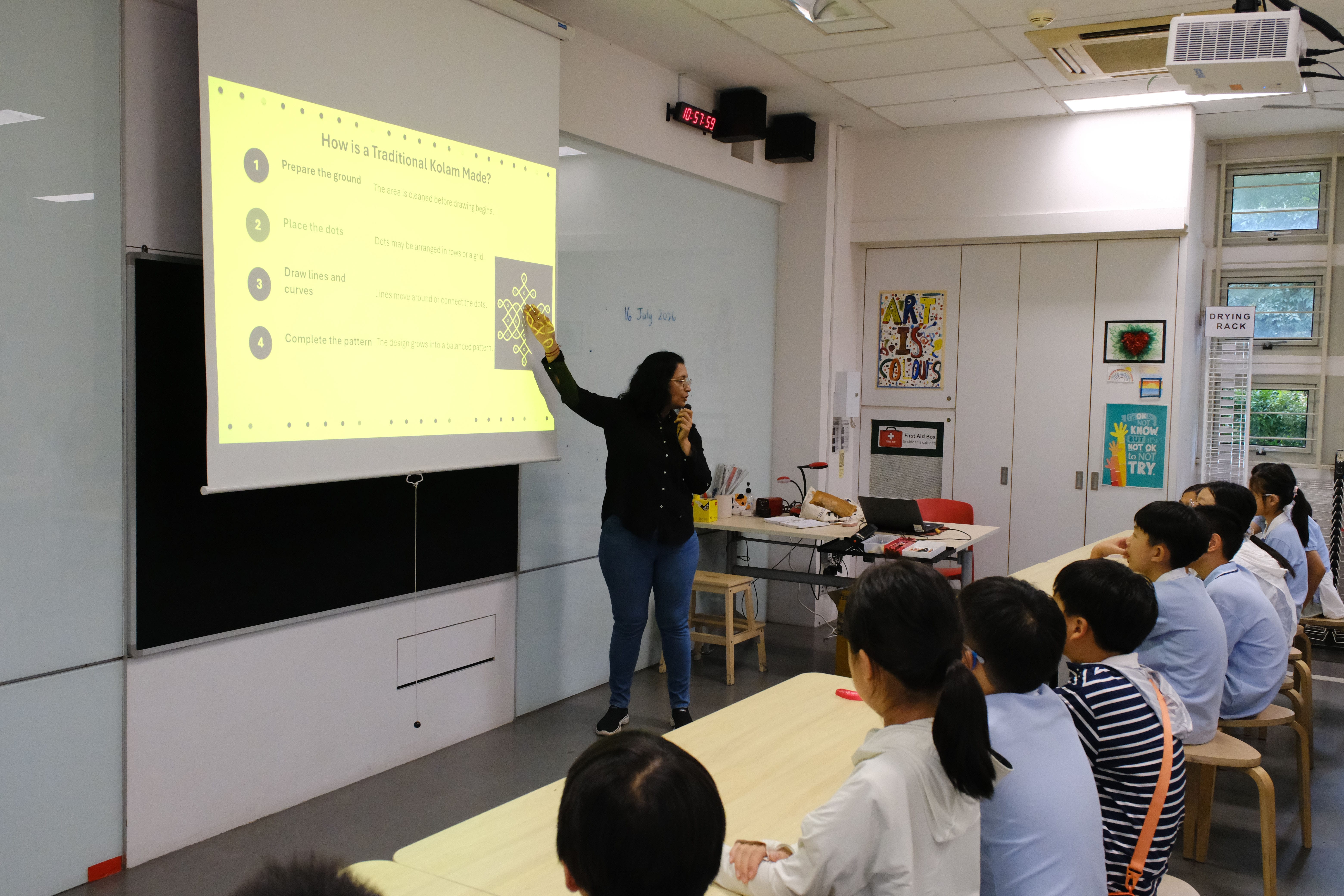 Students learn about the art and tradition of Kolam.